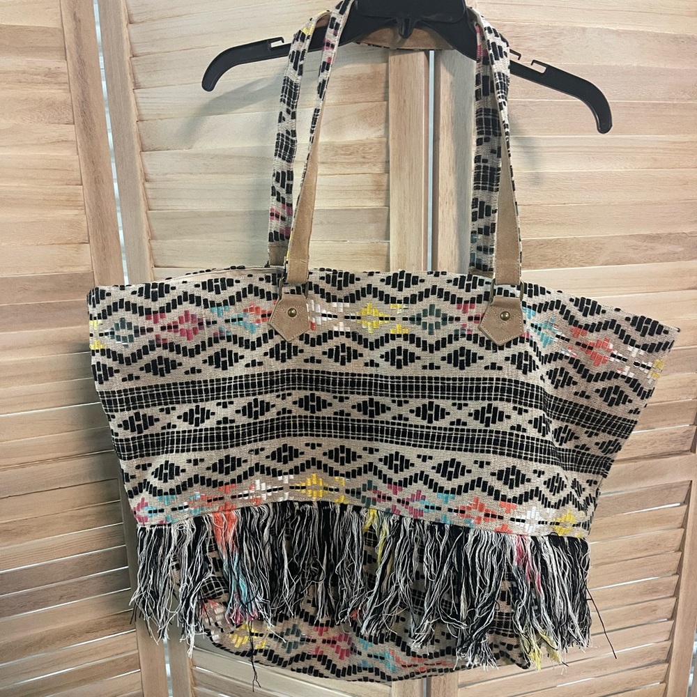Z & L. cloth fringe tote bag.